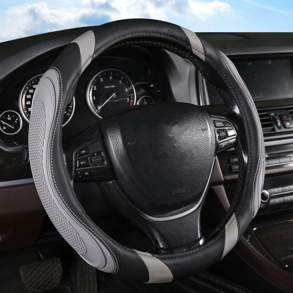 Cross-border stitching car steering wheel cover four seasons universal nail yarn film leather handle cover concave-convex massage car handle cover